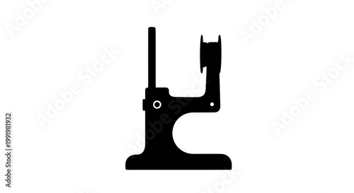 A black silhouette of a paper hole punch on a white background