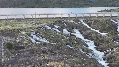 Panoramic aerial view of a large dam and water reservoir in San Luis, Argentina.