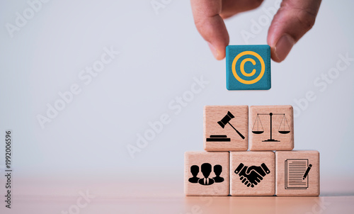Copyright protection and legal compliance concept with intellectual property symbol, contract agreement, justice scale, and business partnership, represent legal rights management, licensing.