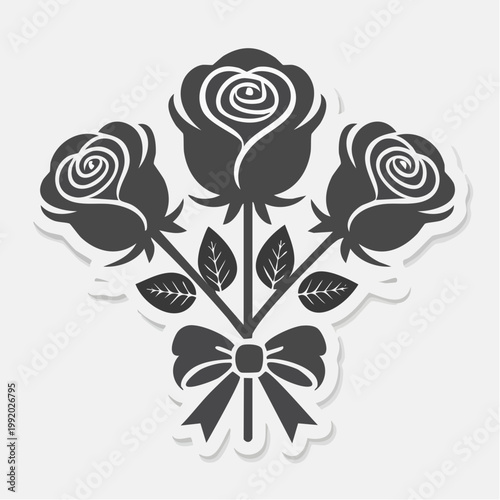 Stylized bouquet of three roses with a bow