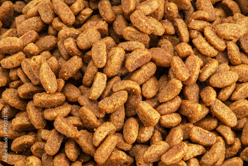 Fotografie Dry pet food or kibbles close up.