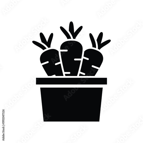 Group of fresh carrots in a planter box as a simple black silhouette icon for gardening or farming organic food concept