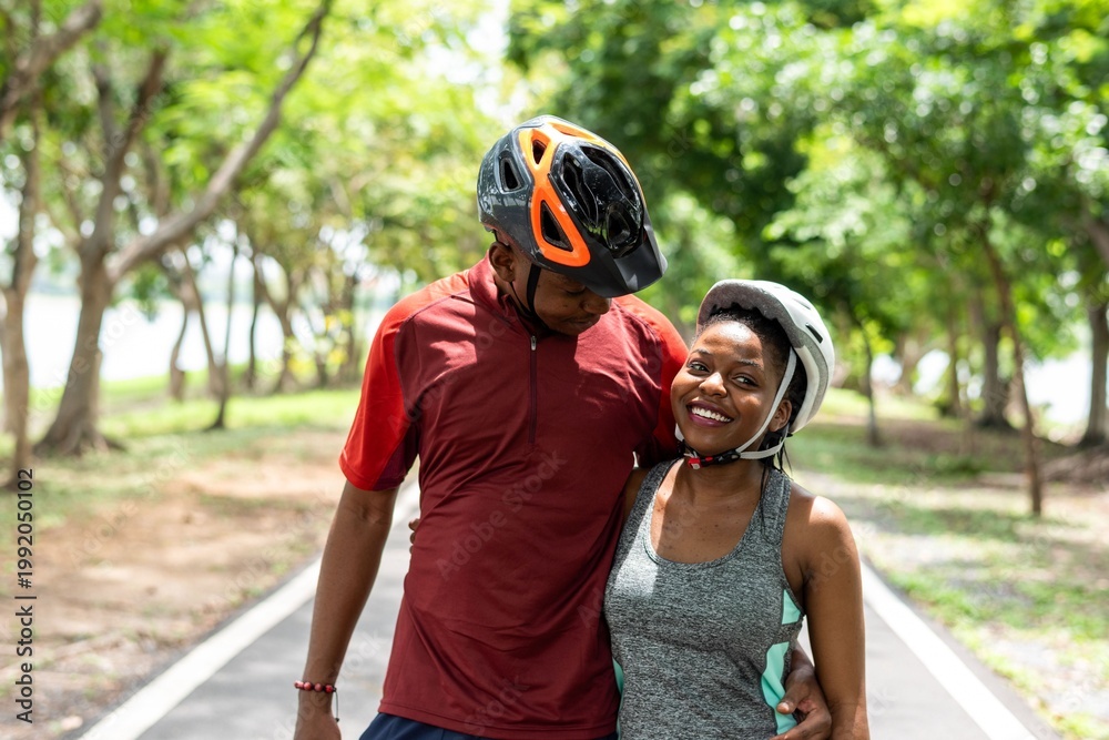 Fototapeta premium Couple cycling in nature park