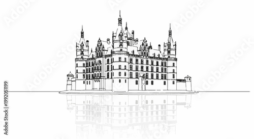 Ornate fairytale castle structure reflected in water