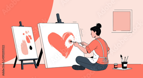 Artist painting a large red heart on canvas, creative inspiration, hobby and passion