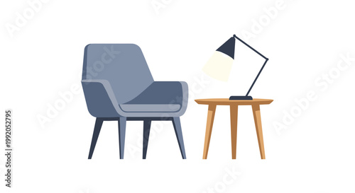 A modern grey upholstered armchair sits comfortably next to a small wooden tripod side table topped with a glowing black desk lamp in a room setting now.