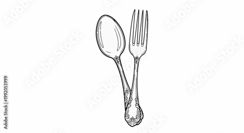 Ornate spoon and fork with floral etching on handles