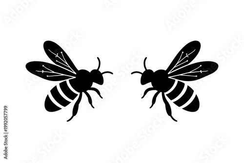 Two black bee silhouettes facing each other on a white background. Simple flat vector illustration of honey bees for logos, icons, or nature-themed designs. Minimalist insect graphic art element.