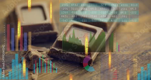 Fototapeta Showing broken dark chocolate square with crumbs melting on wood tabletop, data charts overlaying