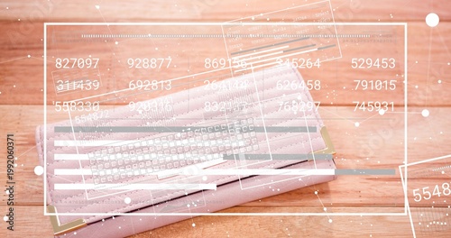 Displaying blush-pink planners resting on warm wood desk with gold corners elastic band ribbon HUD