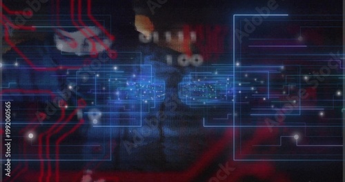 Glowing blue circuit interface pulsing center in dim hardware, showing red trace lines and nodes