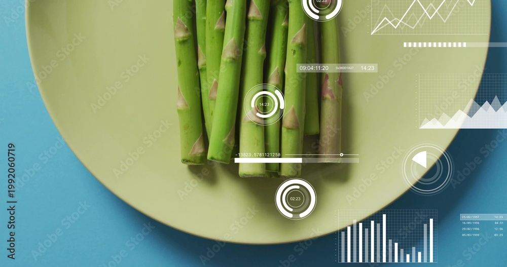 Fototapeta premium Displaying asparagus bundle undergoing scan as overlays appear on green plate in studio for quality