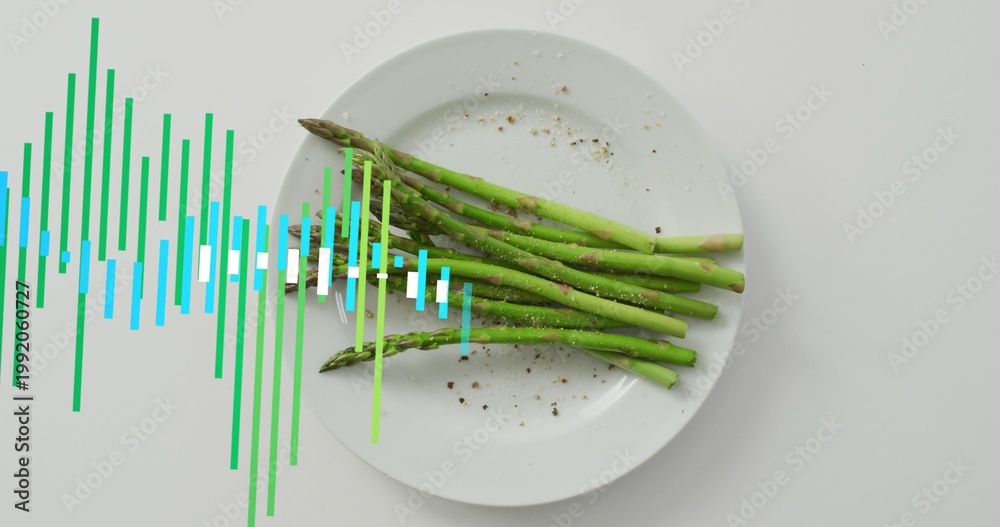 Fototapeta premium Waveform overlay appearing, showing asparagus bundle on white plate, tabletop with pepper and salt