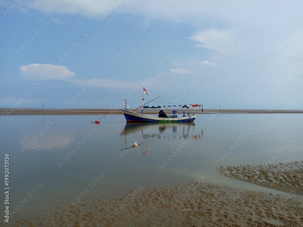 Obraz premium fishing boats on the beach