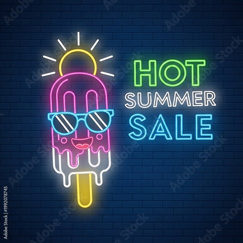 Neon hot summer sale advertisement with popsicle wearing sunglasses on brick wall