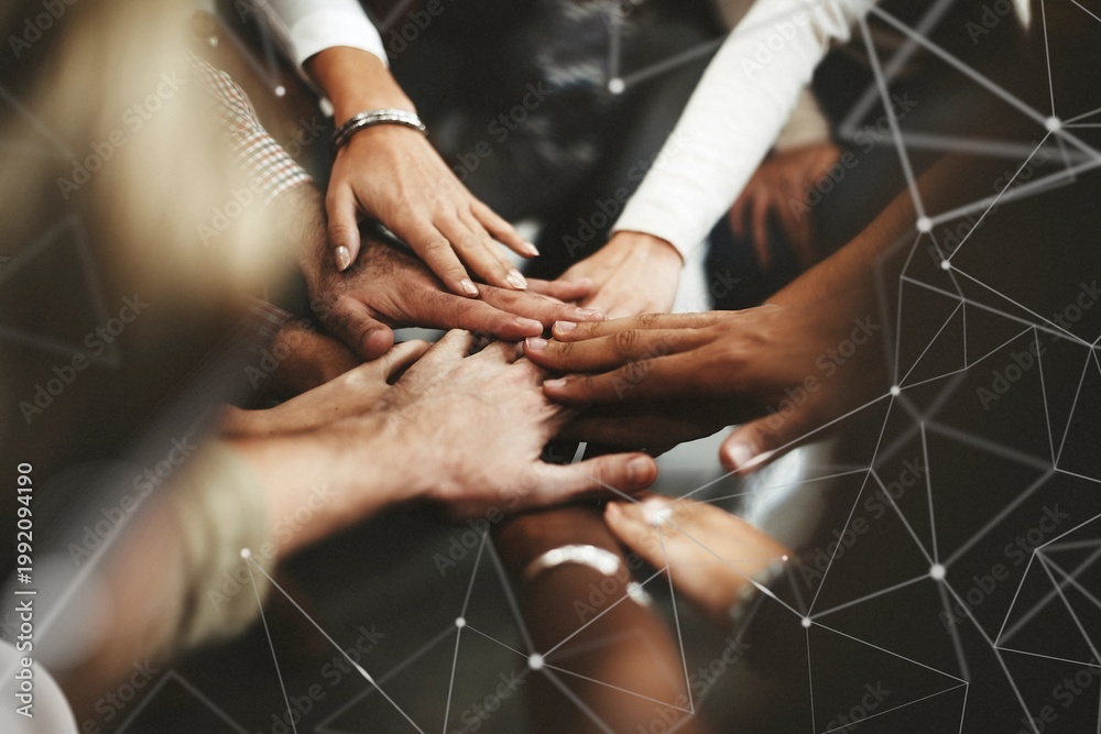 Obraz premium Joined hands for teamwork