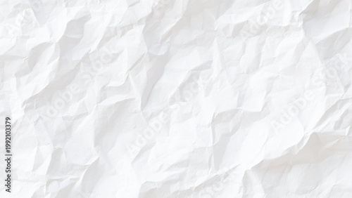 Crumpled white paper texture background with creases and folds