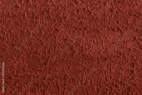 Rich crimson texture fills the frame