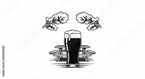 Tall glass of dark beer with overflowing foam, outdoor picnic table