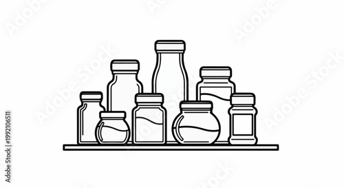 Variety of empty glass containers with lids on a shelf