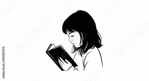 Young person intently reading an open book, focus on profile