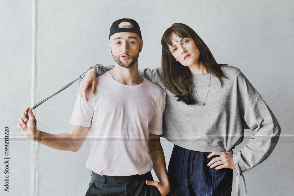 Obraz premium Portrait of a young couple in street fashion