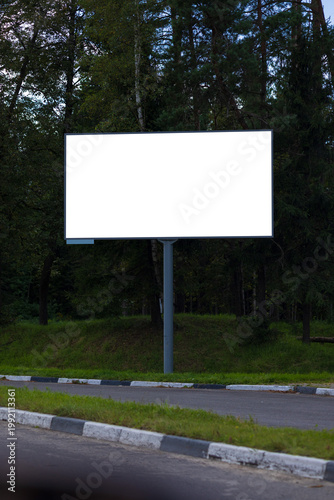 Background for design, billboards on city streets and along roads in the summer day