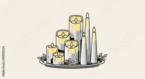 A set of burning candles of varying sizes arranged on a tray with decorative leaves