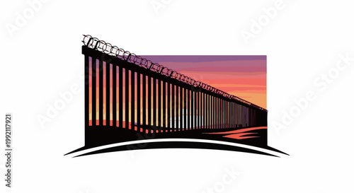 A stark fence topped with barbed wire stretches across a vibrant sunset sky