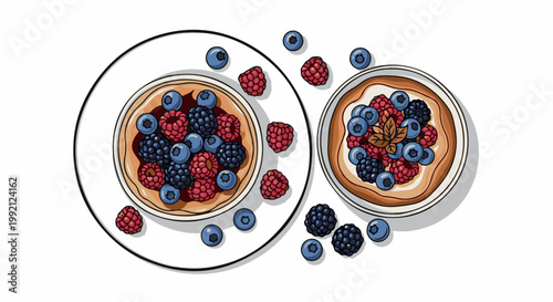 Two plates filled with creamy desserts topped with blueberries, raspberries, and blackberries