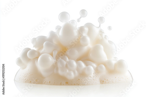 Creamy white foam bubbles splashing and creating a soft cloud on white background