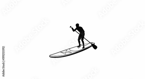 Silhouette of a person paddleboarding on a calm body of water