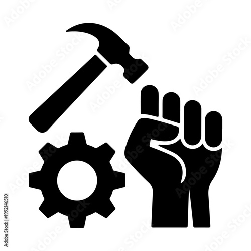 Hammer fist and gear symbols of labor and industrial strength