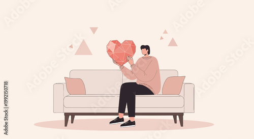 Man holding a geometric heart on a sofa, symbolizing love, self-care, and modern romance