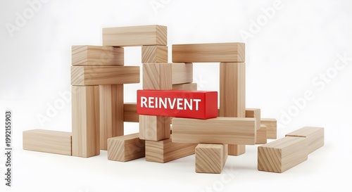transformation concept, block labeled REINVENT, symbol of rebuilding, adaptation and personal or business renewal