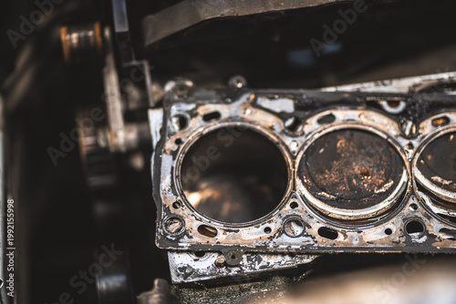 Tableau sur toile Close-up of a worn and dirty car engine cylinder head gasket