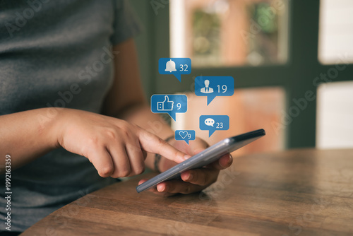 The concept of living on vacation and playing social media. Social media and digital online concept, man using smart phone with Social media. Social Distancing ,Working From Home concept.