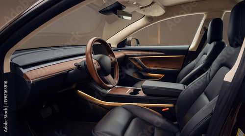 Luxurious Car Interior with Leather Seats and Wood Trim.