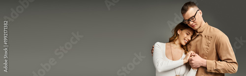 Photography Young couple in stylish clothes share a tender moment filled with love and warmt