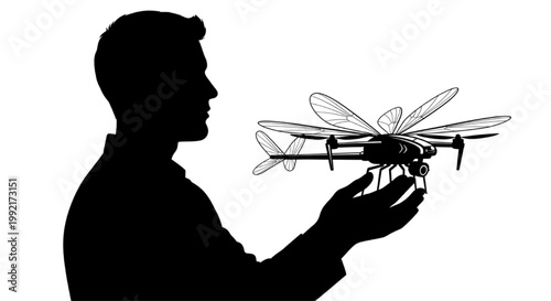 Man holding a drone with dragonfly wings for advanced bionic functional engineering