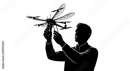 Man holding a drone showcasing futuristic engineering and aerial innovation