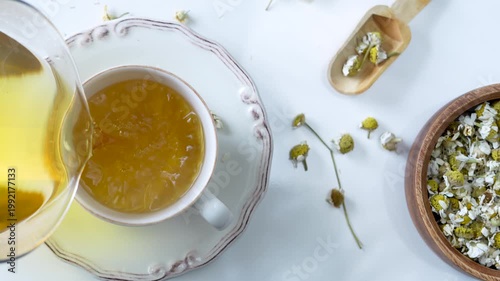 hot daisy tea on table