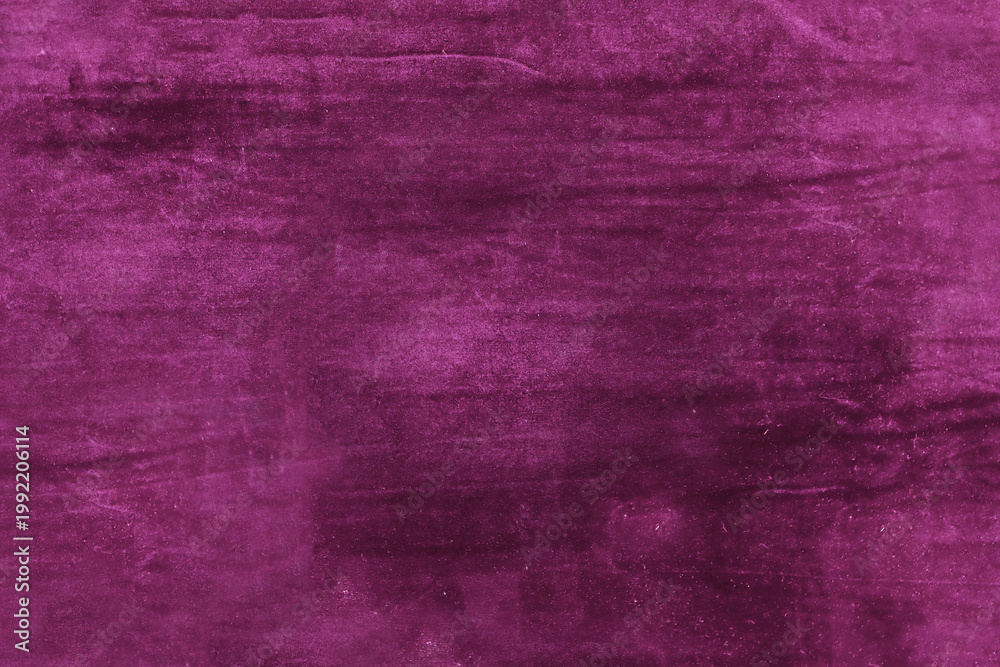 Fototapeta premium Rich velvet texture in deep magenta hue