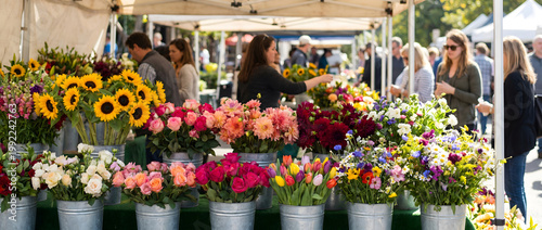 Outdoor market flower stall with customers selecting bouquets under canopy tents