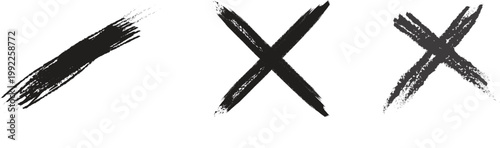 GBlack brush stroke marks and x signs