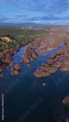 Aerial view from a drone of the Alberche River near the Cazalegas Reservoir, close to the town of Cazalegas. Province of Toledo. Castile-La Mancha. Spain. Europe
