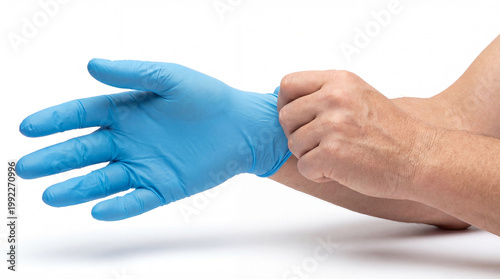 A human hand putting on a blue medical glove for protection and safety, isolated on white background