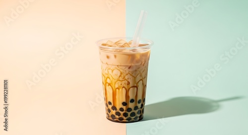 Delicious Boba Tea Drink with Tapioca Pearls in a Clear Plastic Cup, Refreshing Beverage.
