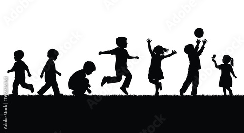 Happy children silhouettes playing together outside having fun while enjoying their active summer childhood days in nature