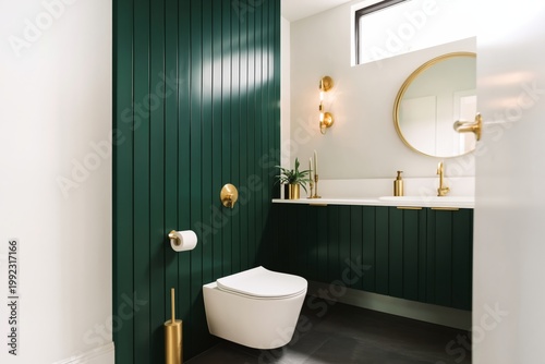 Modern Bathroom Design With Green Paneling and Gold Fixtures in Natural Light